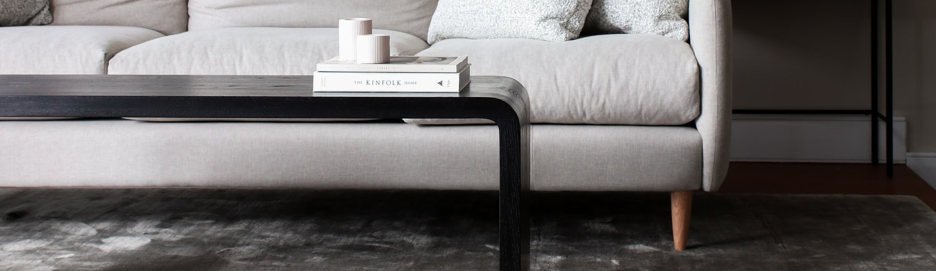 Stylish living room with a grey sofa and a modern coffee table